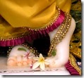 [Krishna's lotus feet]