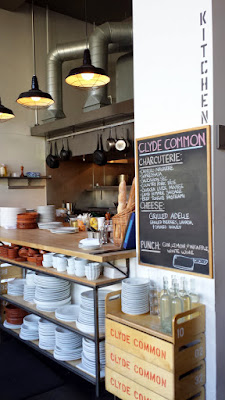 Clyde Common interior, by the kitchen special board