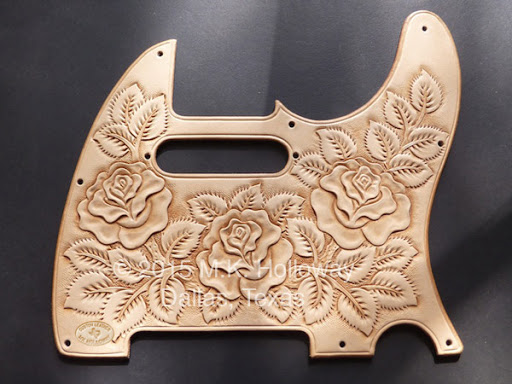 Rose tooled leather pickguard ©2015 M.K. Holloway Dallas, Tx All Rights Reserved