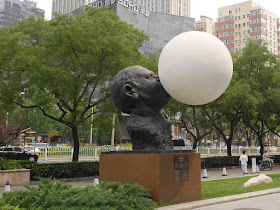 "Black Sculpture" from "Three For You" by Gianni Dessi in front of the Parkview Green in Beijing