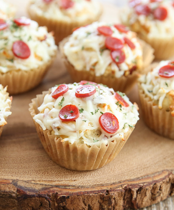 photo of one pizza cupcake with others in the background