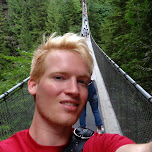 crossing the bridge at the Capilano Suspension Bridge in North Vancouver, Canada 