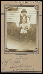 Joseph Niehaus, with one of his Lark family grandsons.  We believe this was taken at the West Street residence.  His daughter, Minnie, wrote on the front of the photo holder.