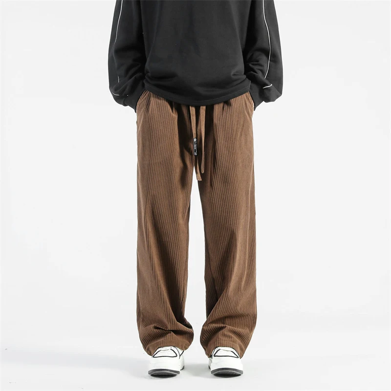 Pantalones casuales de fregona gruesos y rectos sueltos. Comodidad y estilo relajado para el día a día. Perfectos para un look informal y moderno.