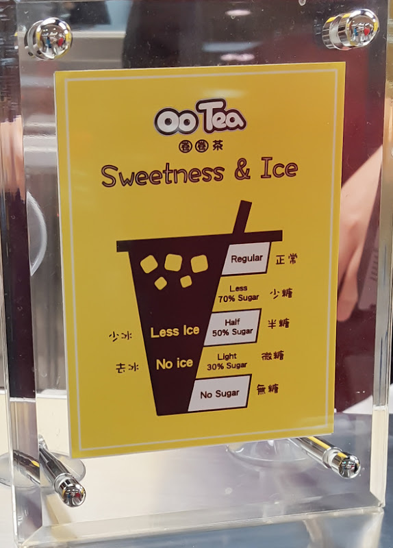 photo of a sign explaining how to order sweetness and ice levels