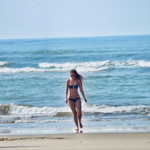 woman in bikini people beaches of Goa sea ocean water