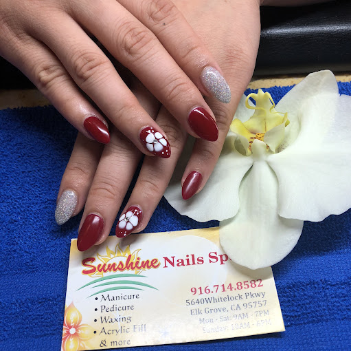 Sunshine Nails & Spa logo