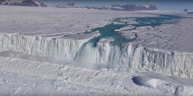 Videos from the Korea Polar Research Institute, and photos from ENV researcher Christine Dow, show that as warmer salt water erodes channels into the ice that attaches the ice shelves to stable land, it also generates massive vertical fractures splitting glaciers from above and below. Surface water melting on top of the ice shelves then pours into these cracks, accelerating the problem further. Photo: Korea Polar Research Institute / University of Waterloo