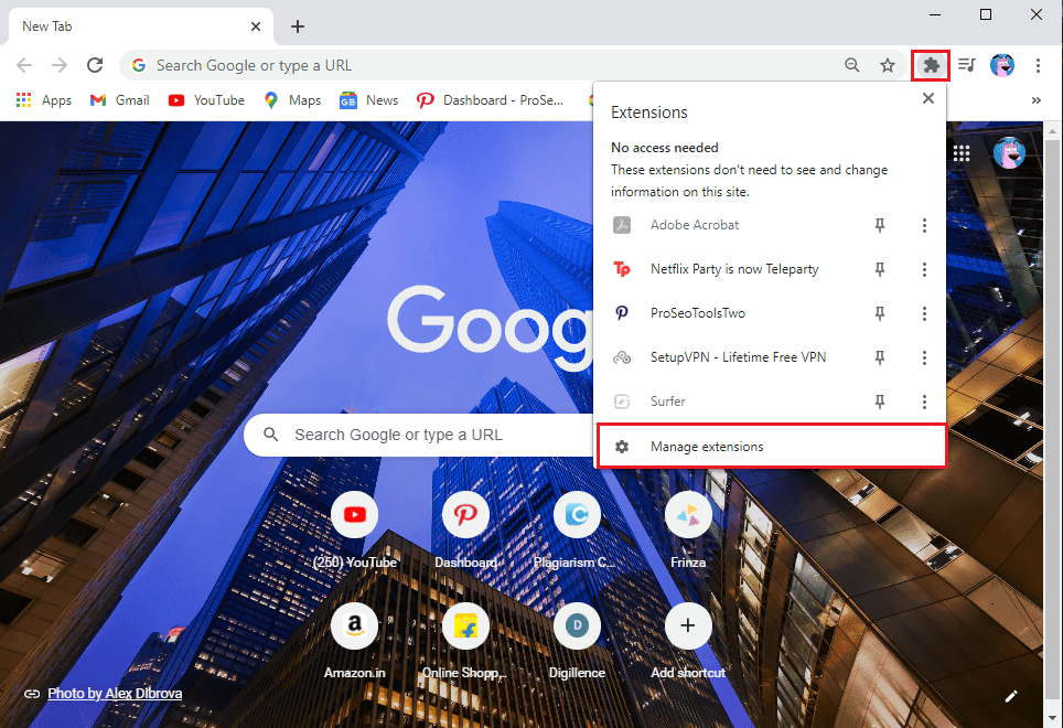 Open uw Chrome-browser en klik op het Extensiepictogram in de rechterbovenhoek van het scherm en klik vervolgens op Extensies beheren.