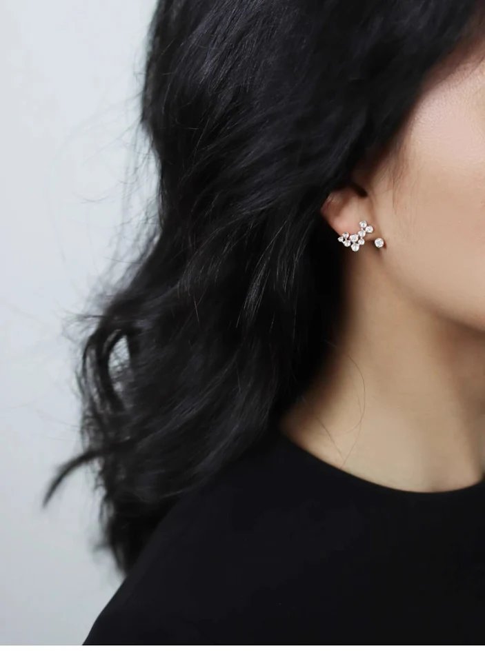 Sterling zilveren lichte luxe zwevende ster oorbellen met temperament, perfect om je stijl en elegantie te accentueren.