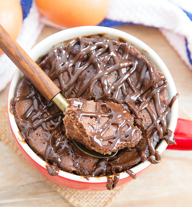 overhead photo of a 4 Ingredient Flourless Chocolate Peanut Butter Mug Cake