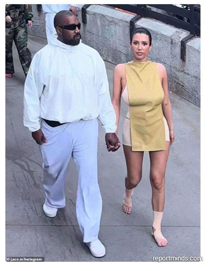 Kanye West Steps Out In White Sweats and Bianca Censori With Bare Feet During Disneyland Outing (Photos)