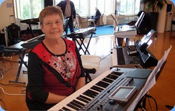 Pam Rea preparing to play her Korg Pa900. Photo courtesy of Dennis Lyons.