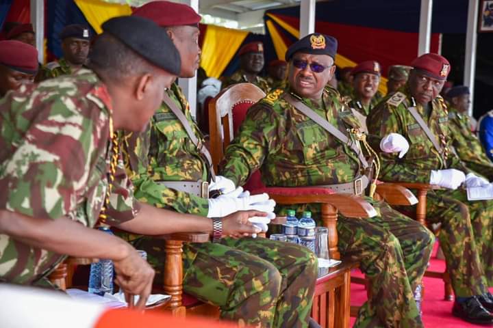 Inspector general Japhet Koome has a word with his deputies Noor Gabow and Edward Mbugua at at the National police college Embakasi ‘B’ campus on January 9, 2022.