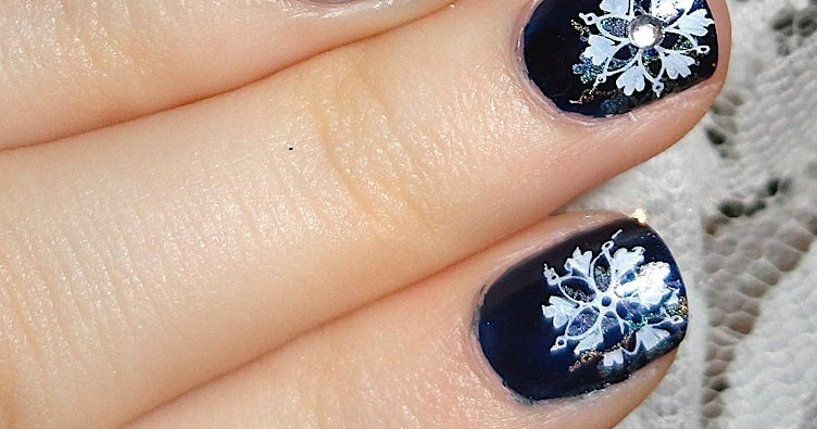 4. Shimmering Snowflake Nail Art - wide 2