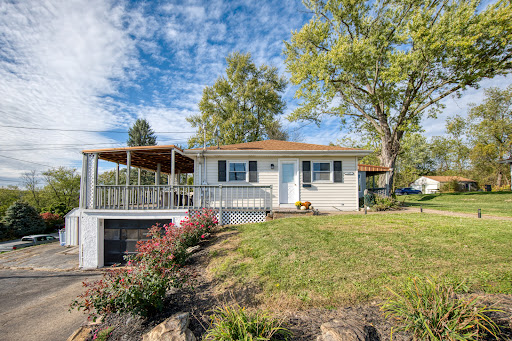 Luxury house for sale in Freedom (United States) - White house with deck and garage