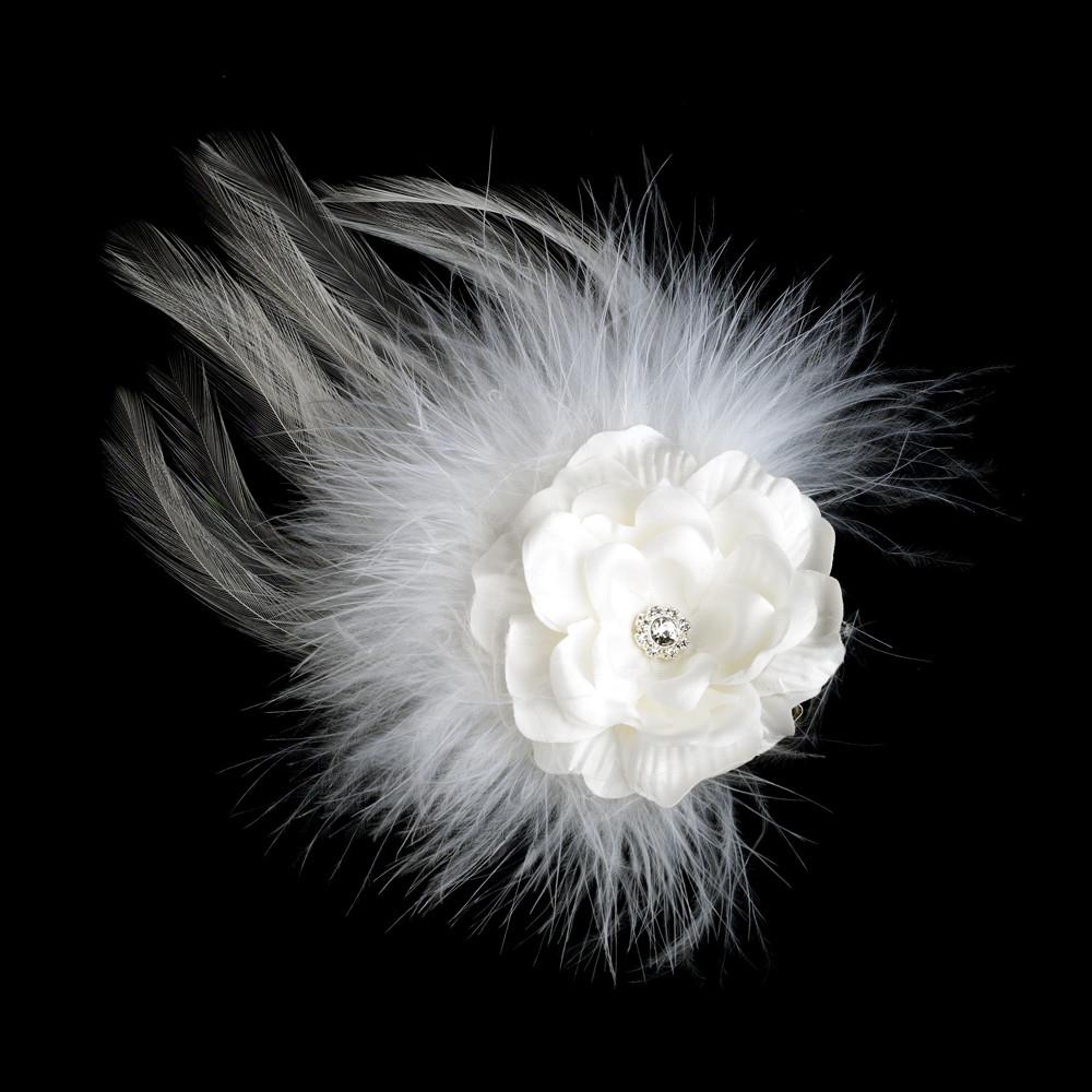 This lovely ivory hair clip is a lovely combination of soft silk petals and