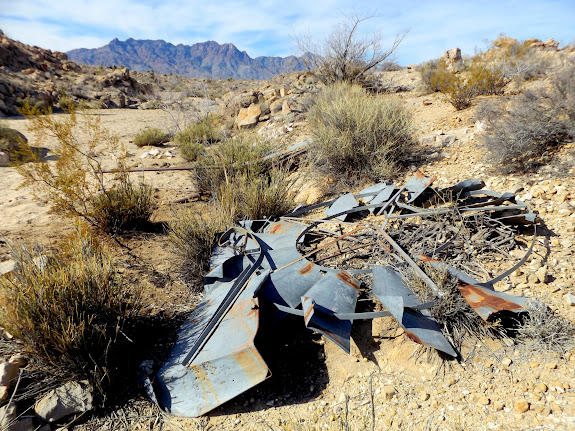 Fallen windmill at Colton Well, Providence Mountains in the background