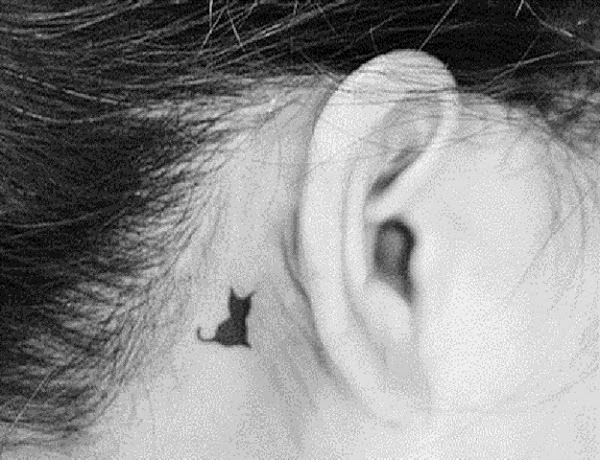 small cat tattoo behind ear