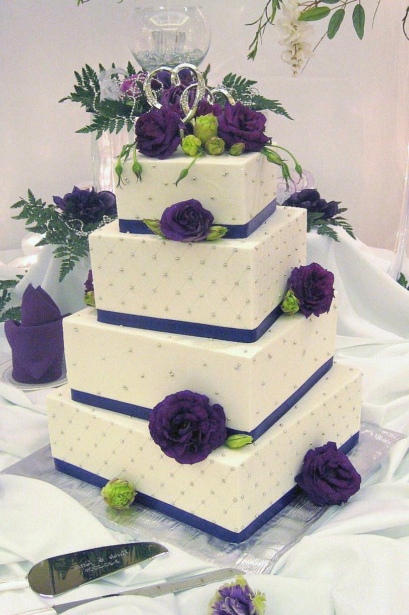 white and purple wedding cakes