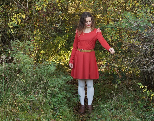 wearing a red dress in autumn