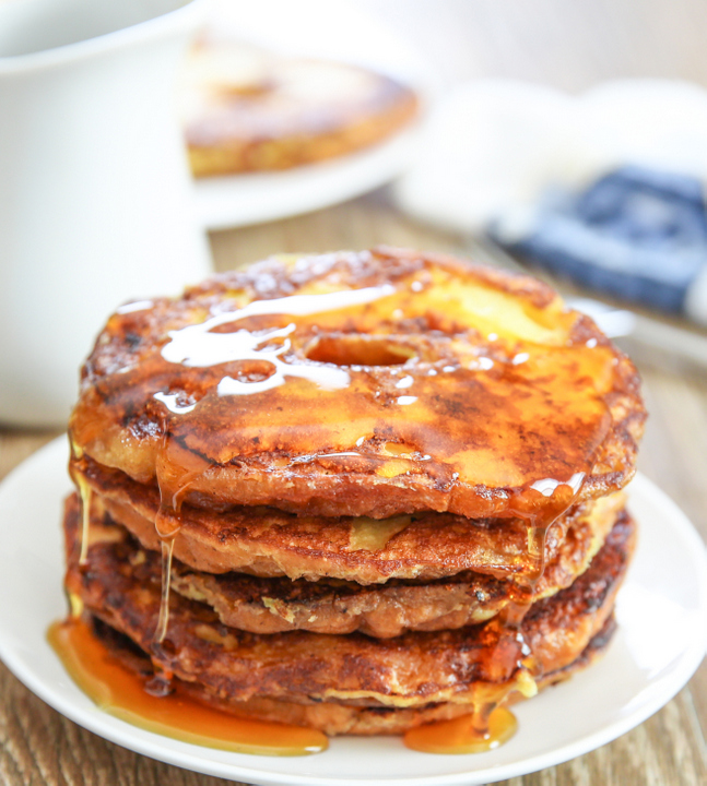 photo of a stack of french toast donuts with syrup