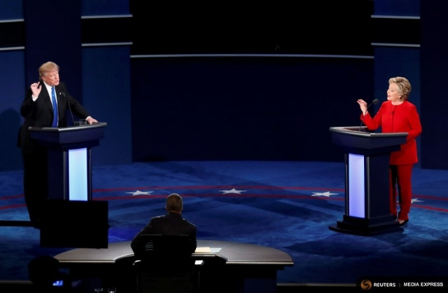 Donald Trump and Hillary Clinton on stage the first presidential debate of 2016, 26 September 2016. Photo: Adrees Latif / REUTERS