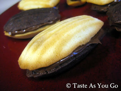 Black and White Madeleine Cookies with Nutella Filling - Photo by Taste As You Go