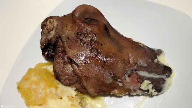 eating svio - Icelandic sheep's head in Reykjavik, Iceland 