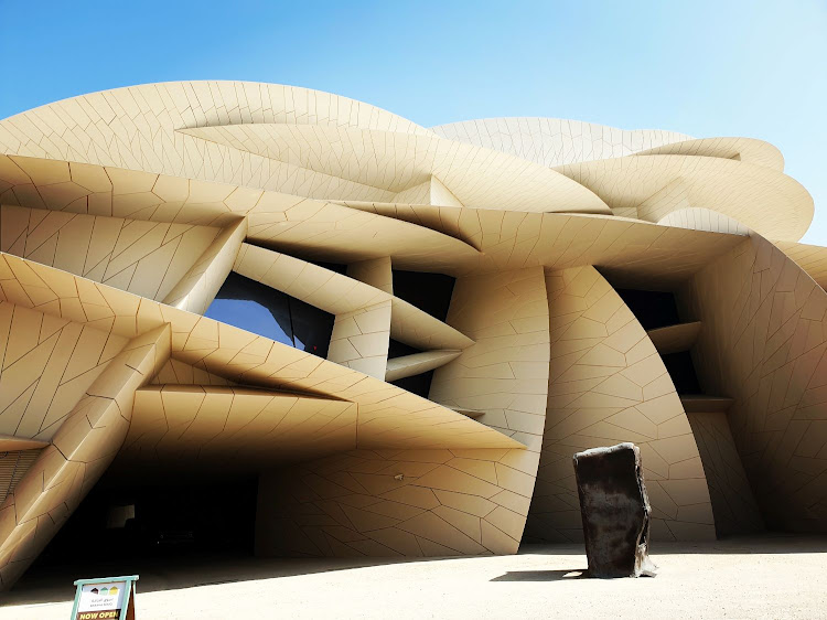 The National Museum of Qatar. This impressive building was designed by Jean Nouvel and is inspired by the crystalline formations dubbed the desert rose.