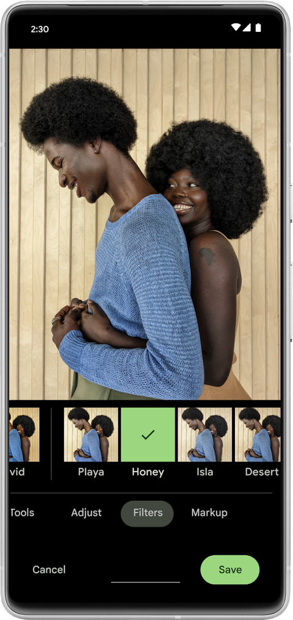 Android phone screen showing an image of two people, with photo editing tool Real Tone open