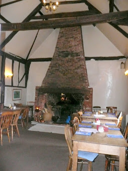 The huge fireplace inside the Queens Head at Bramfield 