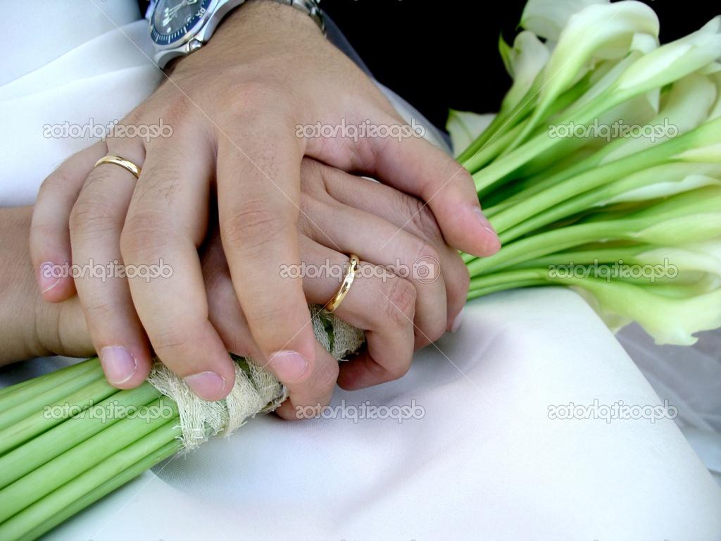 holding hands with wedding