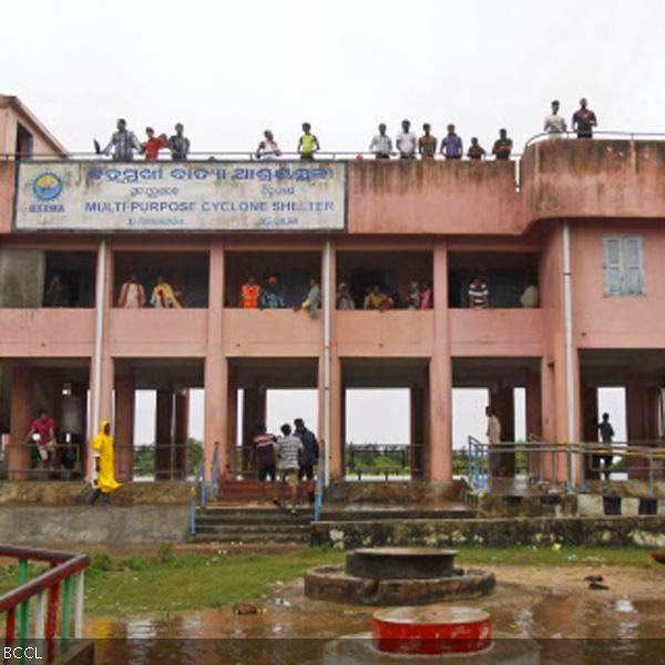 Villagers take refuge in a cyclone shelter at Gokhorkuda village in, Ganjam district about 200 kilometers (125 miles) from the eastern Indian city Bhubaneswar.