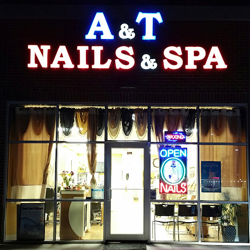 A & T Nails & Spa logo