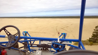 Taking a ride on a Dune Buggy for an Oregon Dunes tour with Sand Dunes Frontier just a little south of Florence, Oregon