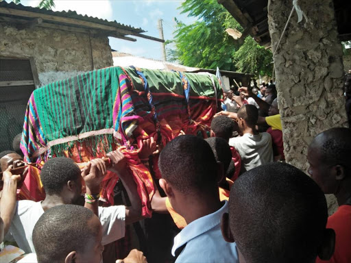 Pallbearers carry Maitha Omar's body for burial in Mweza on Tuesday, September 11, 2018. /ERNEST CORNEL