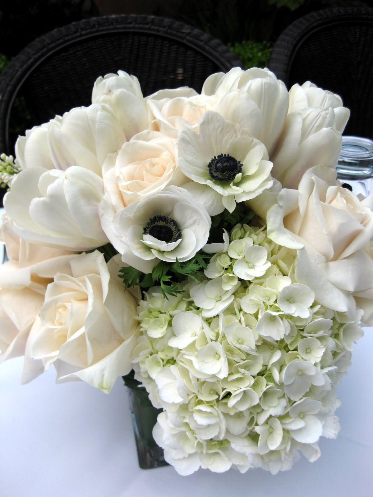 it was the centerpieces! Look! Cream and ivory, square vase,