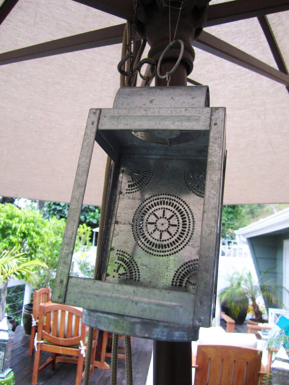 Two metal lanterns hanging