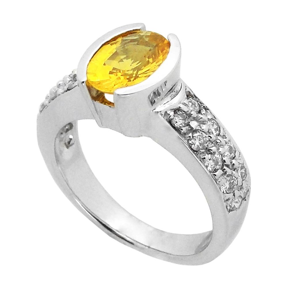 W?th ?n oval yellow sapphire