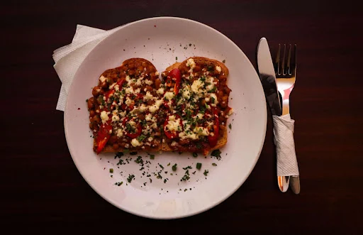 Baked Beans On Toast With Chilli And Cheese