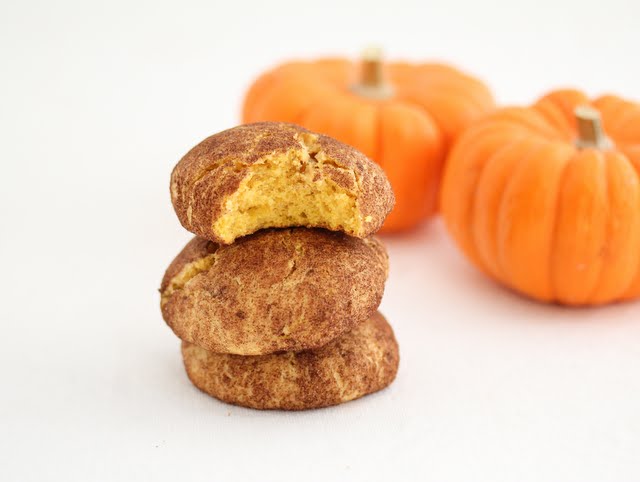 photo of a stack of cookies with the top one with a bite taken out of it