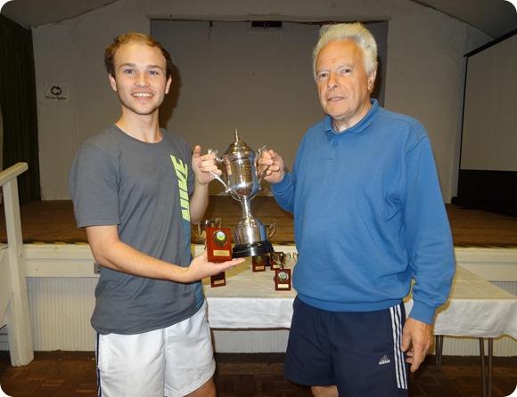 Mens Singles winner Oliver Cox receives the trophy from  Bill Heath - WJTC Chairman