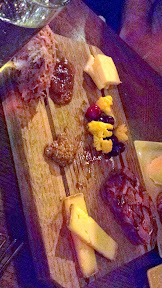 Zeus Cafe Charcuterie Board with rabbit rillette, coppa di testa (head cheese), Asiago Fresca, Ancient Heritage Willow(cow/sheep blend), Pickled Cauliflower & cranberries, Mandarin compote and Mcmenamins terminator mustard