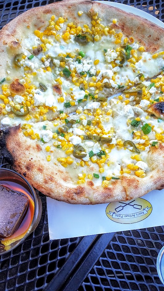 Ken's Artisan Pizza, 12 inch thin crust perfection, this one is the seasonal Fresh corn with corn, mozzarella, ricota salata, smoked pickled jalapenos, scallions and the Ken's Old Fashioned with Evan Williams, Ramazotti Amaro, demerara sugar, Angostura bitters, and orange skin