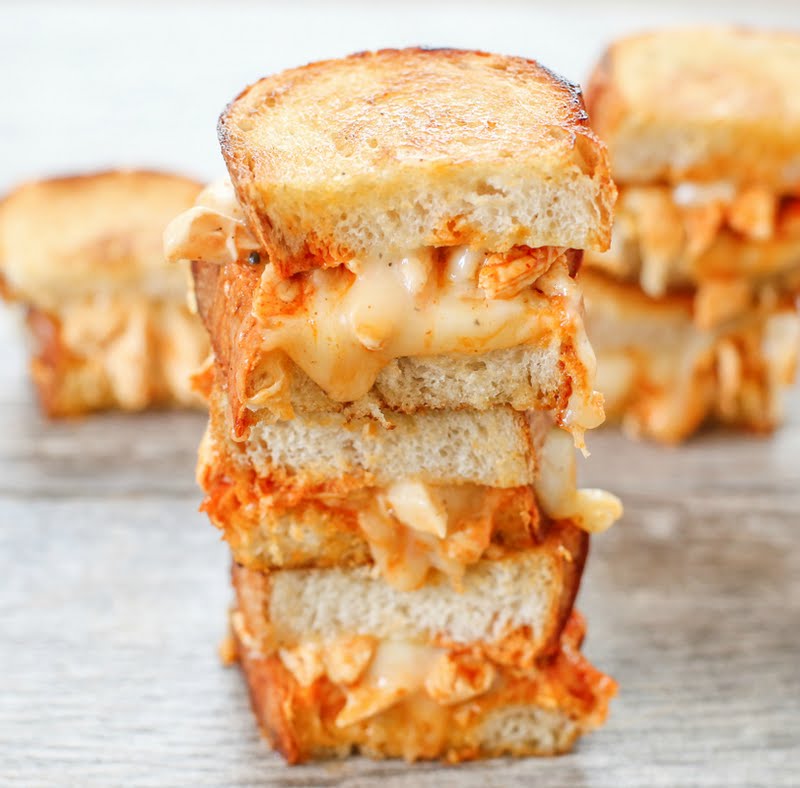 close-up photo of a stack of Chicken Enchilada Grilled Cheese Sandwiches