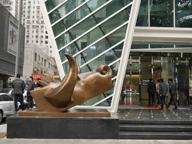 sculpture of bovine head in front of the Ruihe Building (瑞和大厦) in Shenzhen