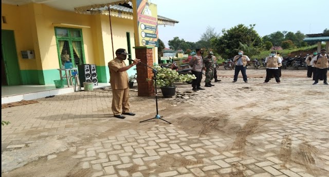 Kapolsek Dolok Merawan Hadiri Apel Pelepasan Relawan PPKM Mikro