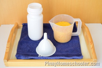 Pouring Rice using a Funnel