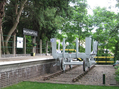 Platform with track and rail wagon